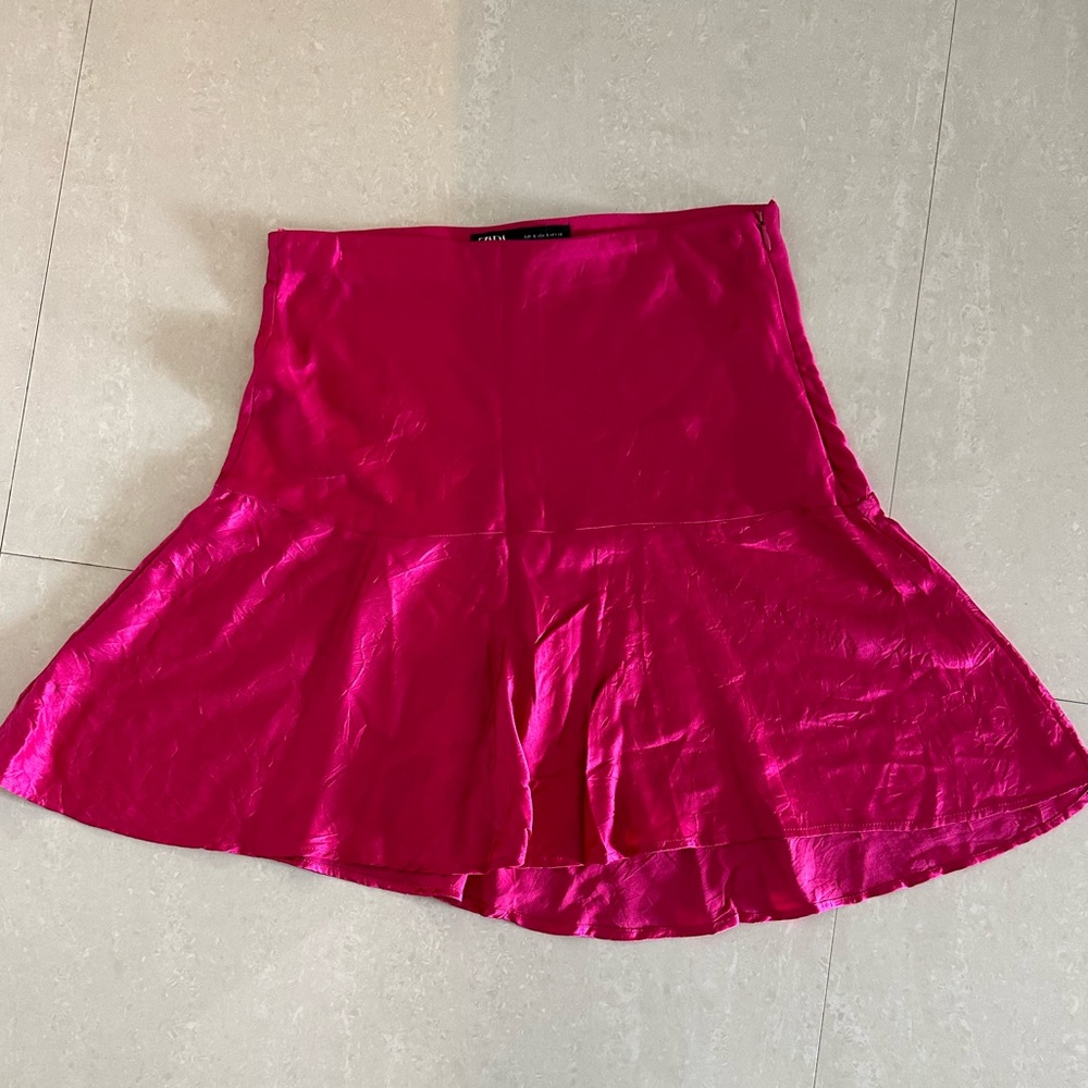 Is Barbie season over? Small wrinkly style skirt.